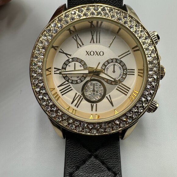 3/$30 XOXO Watch Women Gold Tone Crystal Bezel Quilted Slip Thru Band - Picture 1 of 14